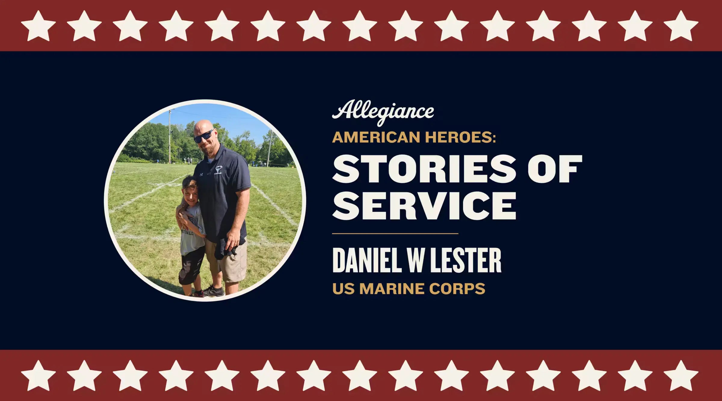 Daniel W Lester, US Marine Corps veteran, standing on a sunny field hugging a young boy, showcasing their bond